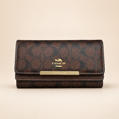 The Coach Slim trifold Wallets