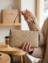 Signature canvas shoulder bag