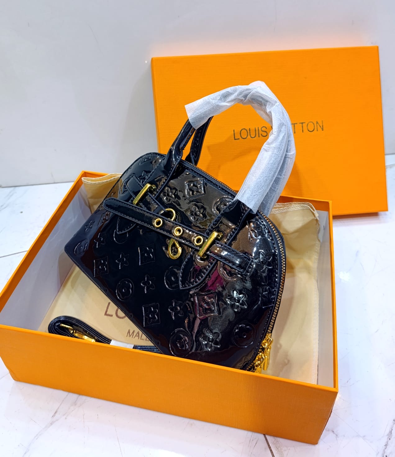 Alma shining Handbags