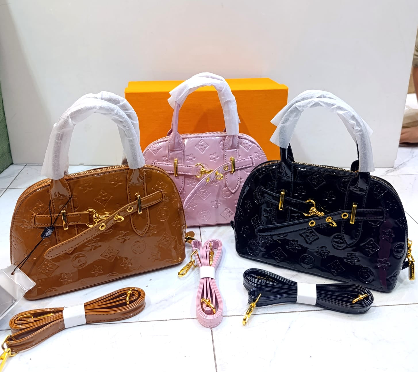 Alma shining Handbags