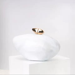 Marble clutch