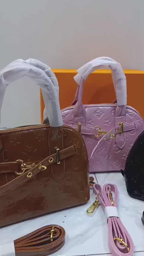 Alma shining Handbags